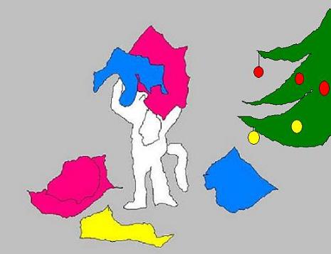 kenny with wrapping paper under the tree